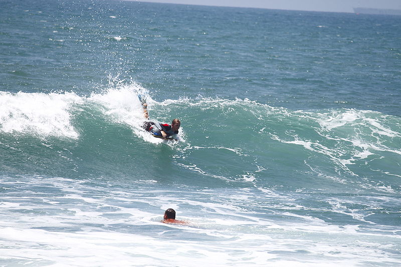 Bolsa Chica State Beach Park in Huntington Beach, California surfboarding